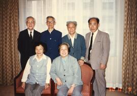 Group photo of Dr. Henry Hu and unidentified guests