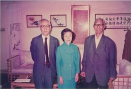 Dr. Henry Hu, Dr. Chung Chi-yung and an unidentified guest at their office